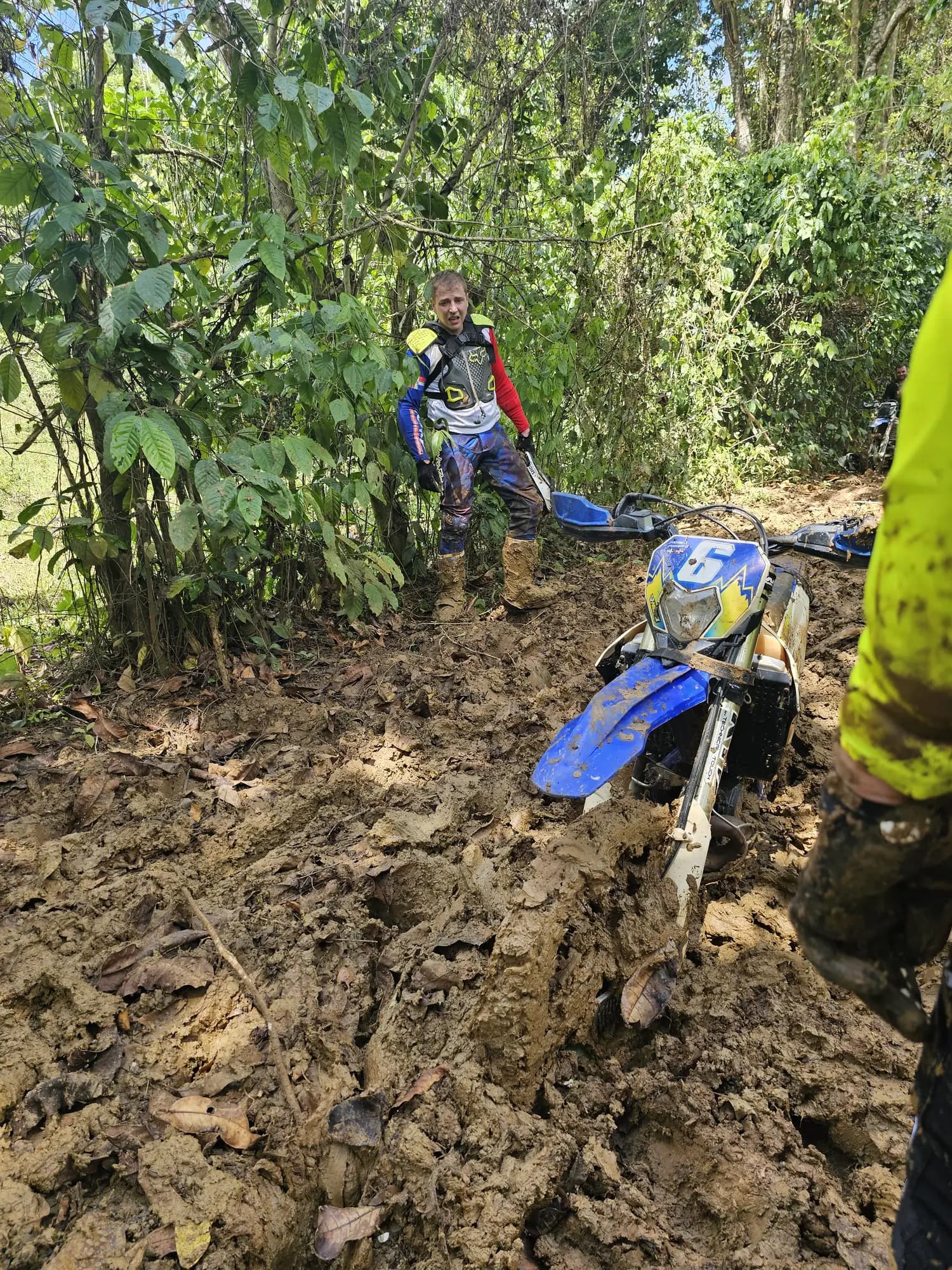 Bike in deep mud on a jungle trail