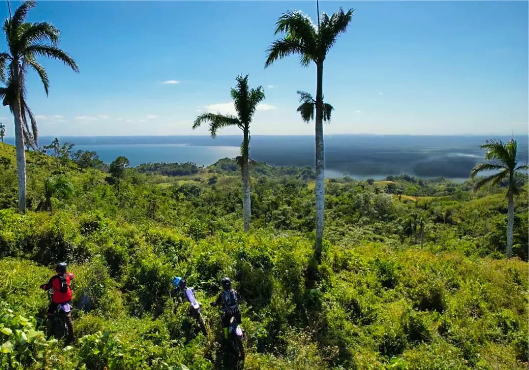Riders on a ridge trail above the Samaná coast