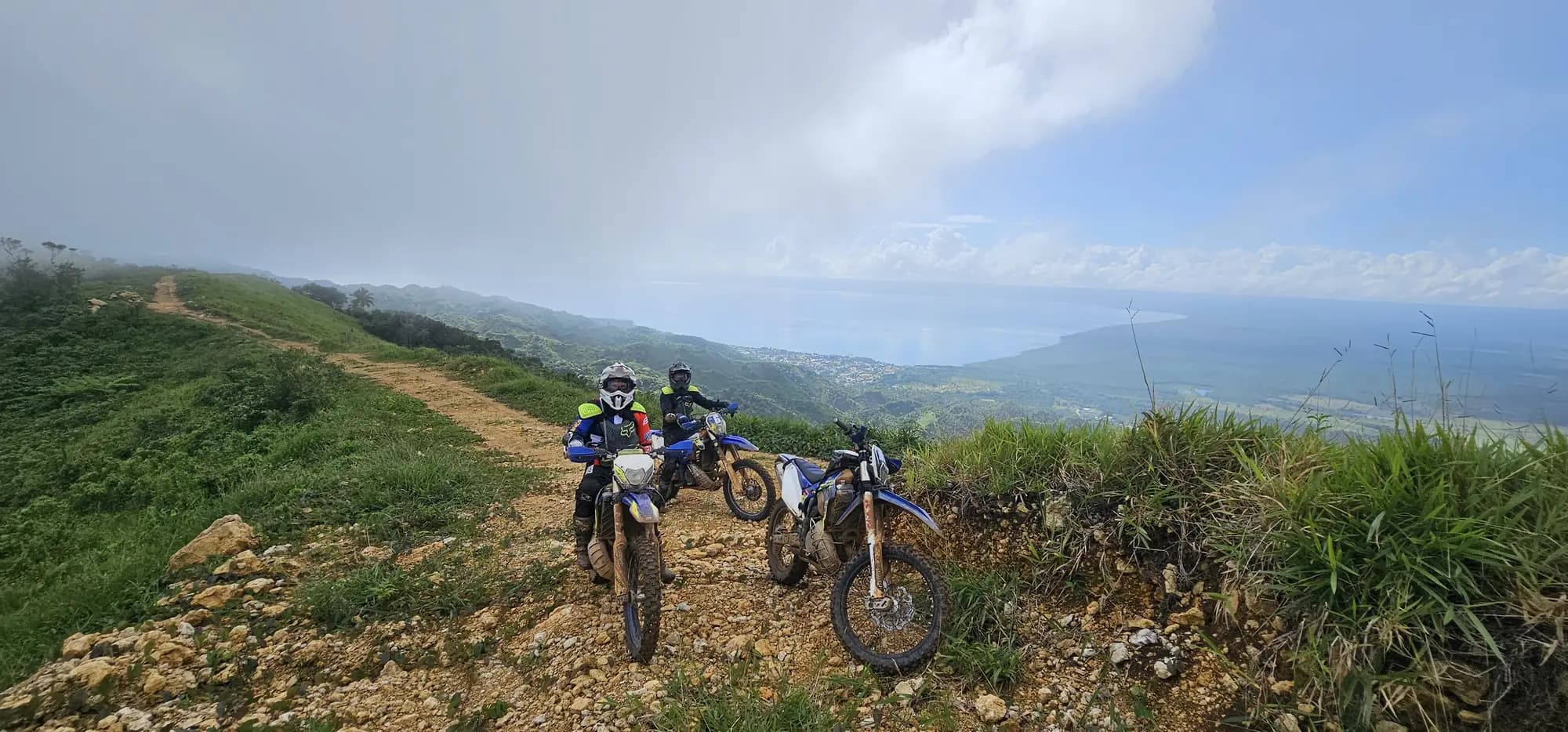 Bikes on a hilltop with sea fog rolling in