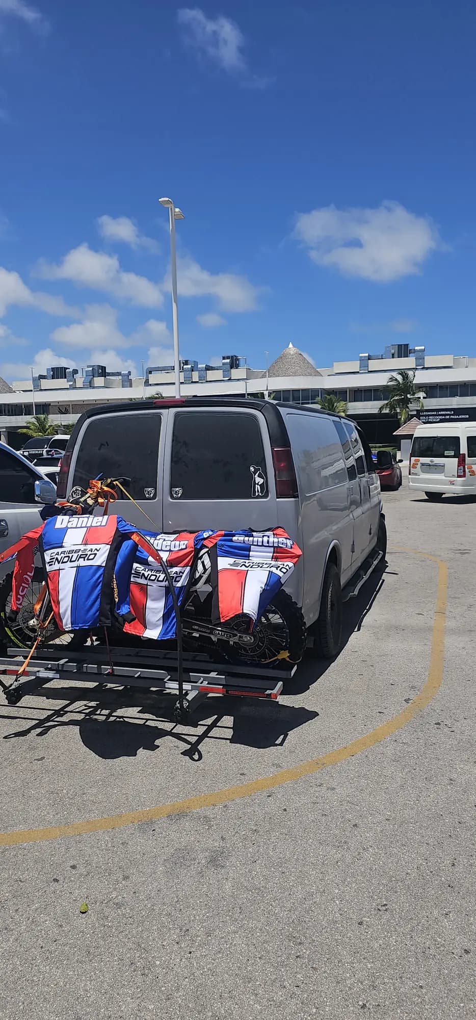 Support van carrying the bikes between regions